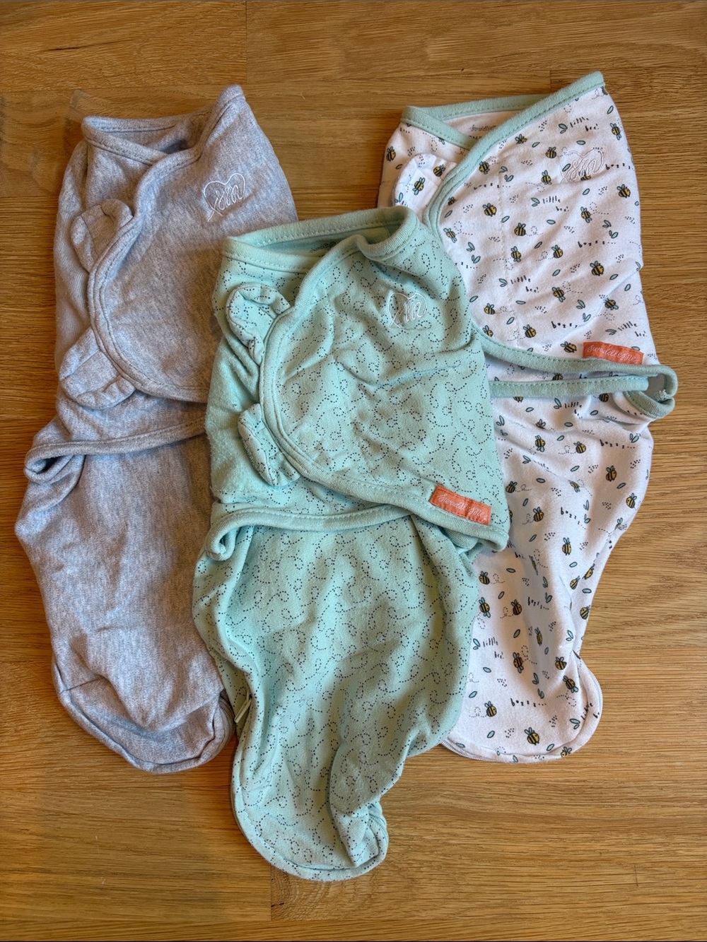 SWADDLEME Baby One-Piece swaddle in Gray, Mint, and White Bee Print